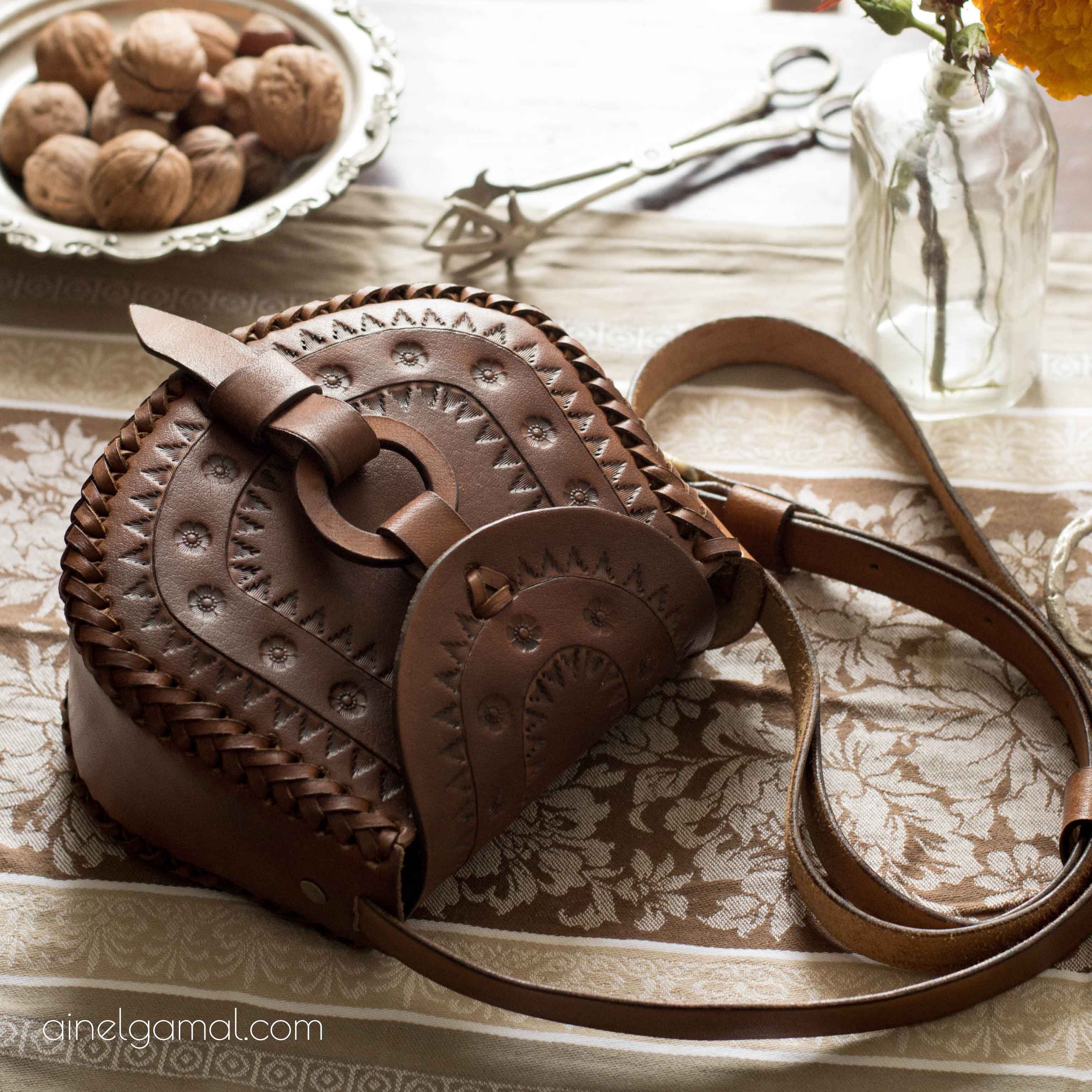 شنطة جلد طبيعي عين الجمل دق وحفر