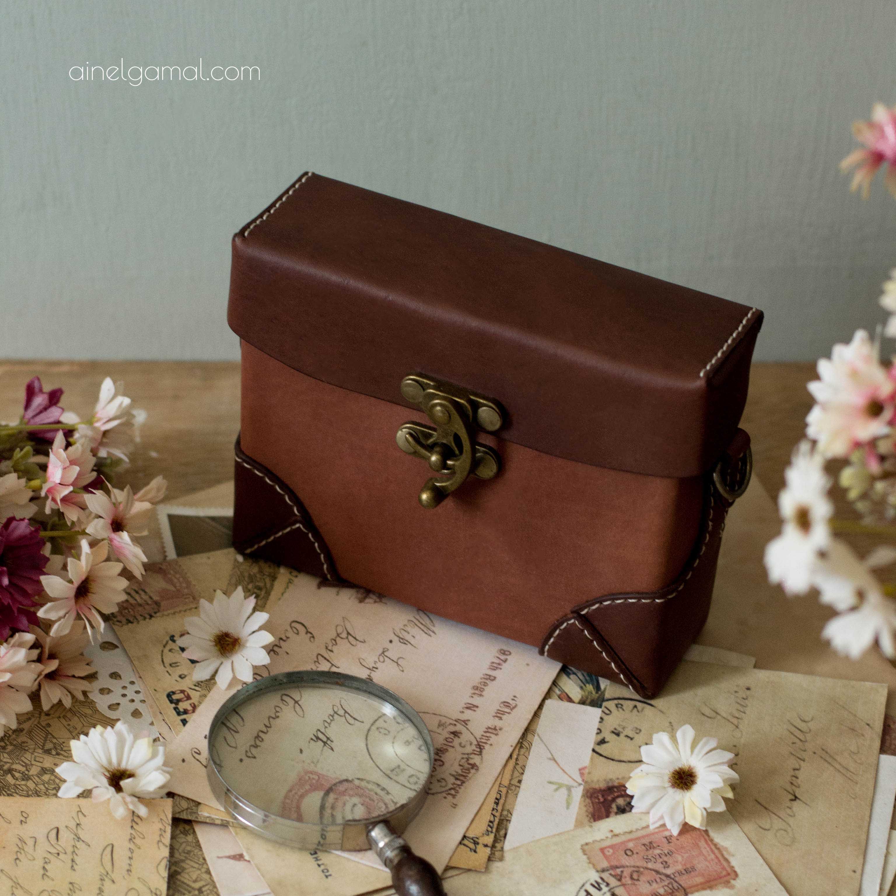 cuboid leather bag ainelgamal